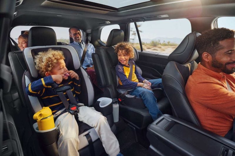 A family is seated in a 2024 Grand Highlander with lots of space.