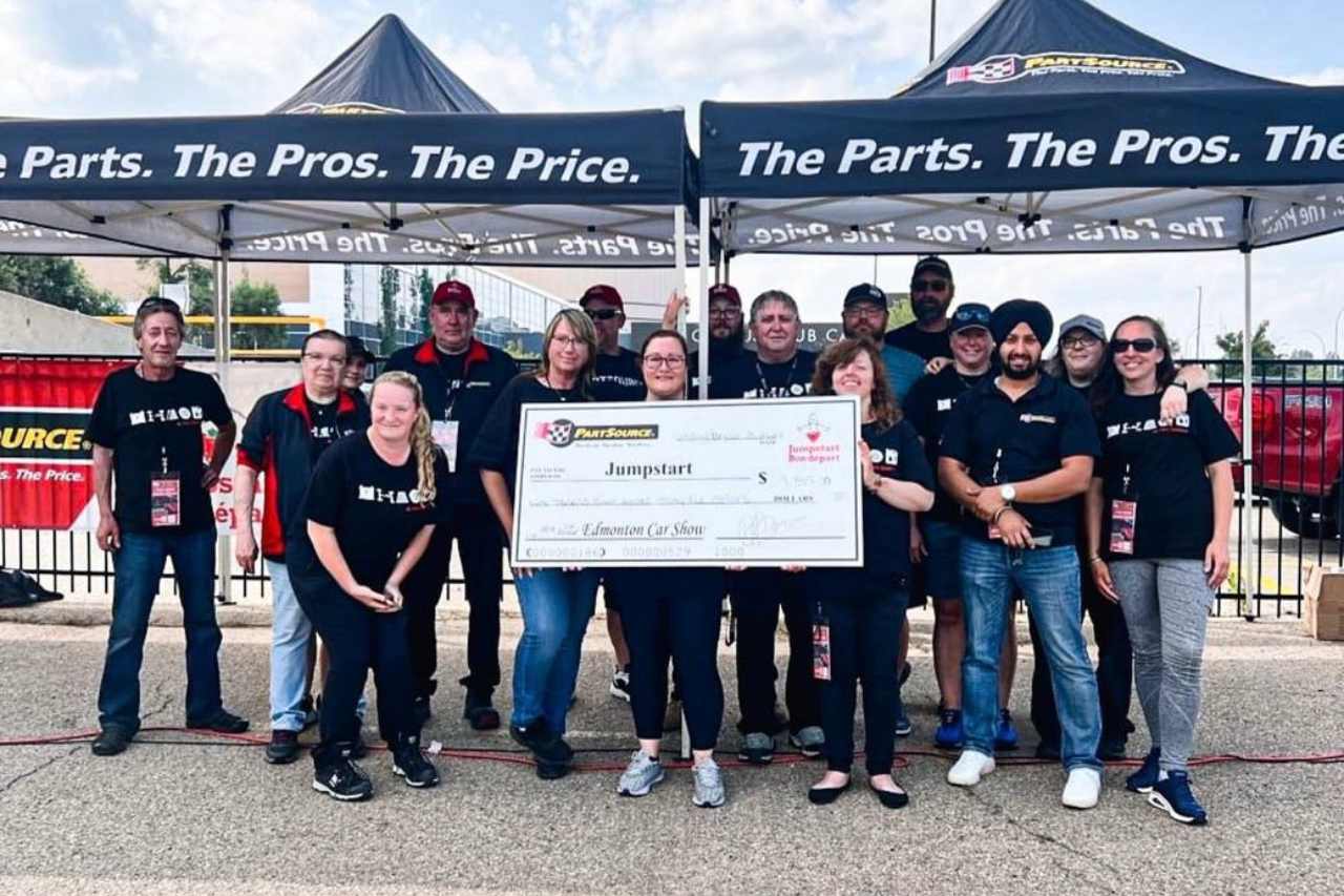 The large cheque showcasing the amount of money donated to Jumpstart at the charity car show in Edmonton.