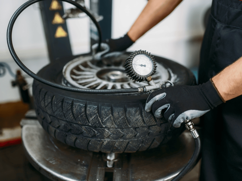 mechanic checking itre pressure