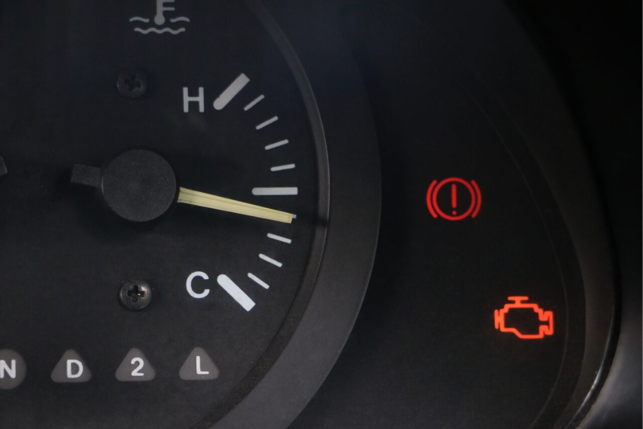 closeup of sign showing oil change is required for the car