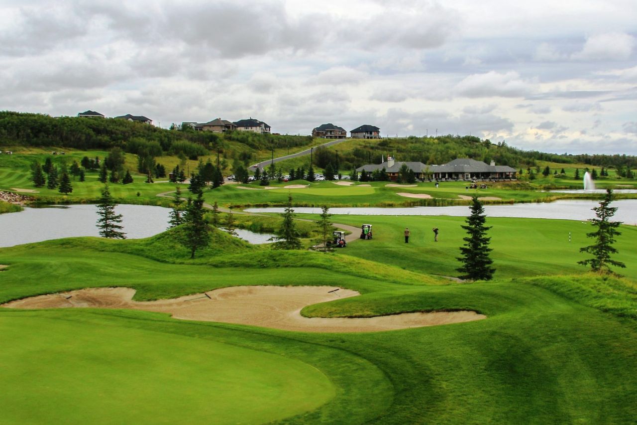 WEM Toyota Tees Up for Children_s Autism Services Edmonton-1 A birds-eye-view of the Quarry Golf course green on a mildly cloudy afternoon in Alberta, Canada.